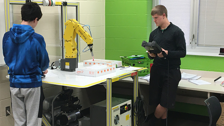 2020 - SME PRIME Success Stories - Anna High School - Students training with Fanuc Robots.jpg