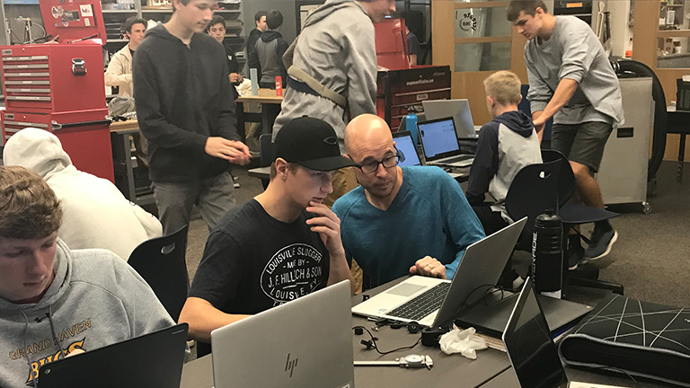 SME-PRIME---Shape-Corp---Grand-Haven-High-School---Jeremy-Case-with-Students.jpg